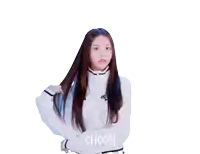 a girl in a white sweater with the word choom on the bottom