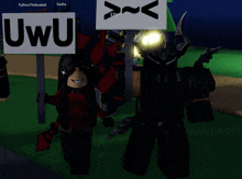 a person holding a sign that says " uwu " next to another person