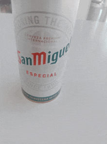 a bottle of san miguel especial is on a table