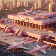 a large pink building that says barbz international airport