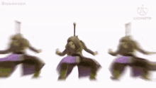 a group of ninja turtles are dancing together on a white background in a blurry video .