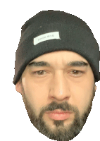 a man with a beard is wearing a black beanie with a white label that says ohor boo