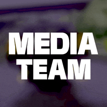 a purple background with the words media team in white letters