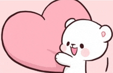 a cartoon bear is holding a pink heart in its paws .