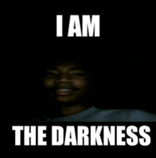 a picture of a man with the words " i am the darkness " above him