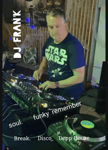 a man wearing a blue star wars shirt is playing music