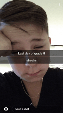 a boy is taking a picture of himself and the caption reads last day of grade 8 streaks