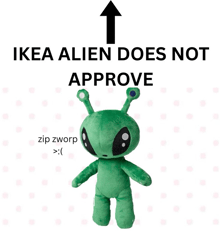 an ikea alien does not approve sign with a stuffed green alien