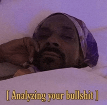 snoop dogg is laying in bed with the words analyzing your bullshit on the bottom