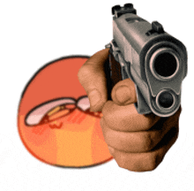 a hand is holding a gun in front of a cartoon face