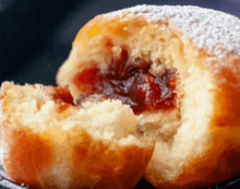 a close up of a doughnut with a bite taken out of it