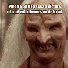 a picture of a man with flowers on his head with the caption when a pit hag sees a picture of a pit