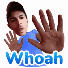 a man in a blue shirt is making a stop gesture with his hands and the word whoah behind him