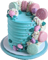 a cake with blue frosting and pink and purple macarons