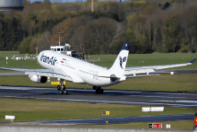 a plane with iran air written on the side