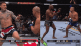 two men are fighting in a ufc heavyweight championship fight