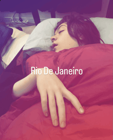 a woman is sleeping in a red blanket with the words rio de janeiro written above her