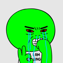 a green cartoon character is crying and wearing a shirt that says i am sliding