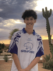 a young man wears a shirt that says baren-apotheke on it