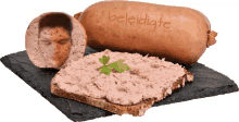 a piece of bread next to a sausage that says beleidigte on it