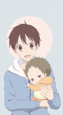 a boy holding a baby in his arms with a circle in the background