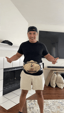 a man wearing a belt that says world heavyweight