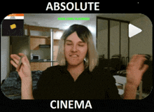 a video of a woman with the words " absolute cinema " above her