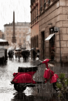 a red scooter is parked in the rain in front of a building with a sign that says ' optical ' on it