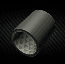 a roll of black tape with green triangles on the inside