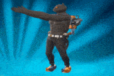 a man in a cat mask is standing with his arms outstretched in front of a blue background