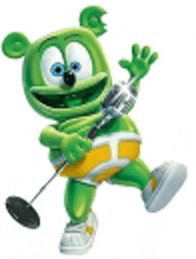 a green gummy bear is holding a microphone and a drum stick .