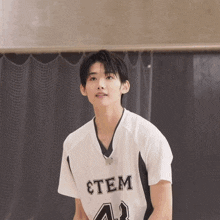 a basketball player wearing a stem jersey number 41