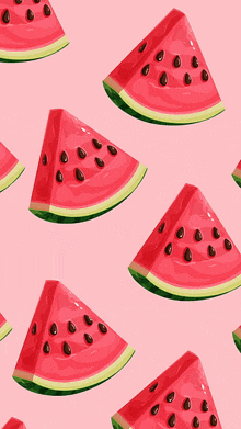 watermelon slices on a pink background with seeds