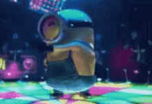 a minion is dancing on a disco floor in a dark room