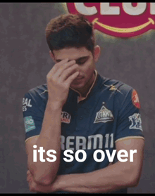a man wearing sunglasses and a hat with the words " it 's so over " on the bottom