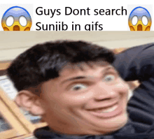 a man with a surprised look on his face and the words guys dont search sunjib in gifs below him