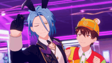 a boy with blue hair is wearing bunny ears and a yellow hat