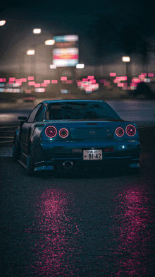 a blue car with the license plate 81-42