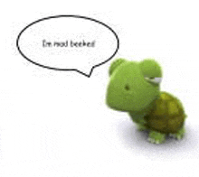 a green stuffed turtle with a speech bubble that says `` i 'm mad beecked '' .