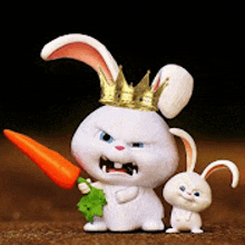 a toy rabbit with a crown on its head is holding a carrot .