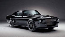 a black muscle car with the word gt on the front