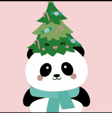 a panda bear wearing a scarf and a hat with a christmas tree on top of it .