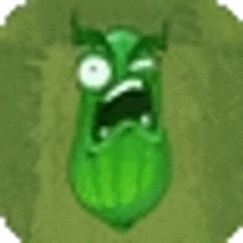 a green cartoon character is making a funny face .