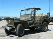 a green military vehicle with the number 9 on the side