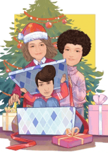 a girl in a santa hat is holding a child in a gift box in front of a christmas tree