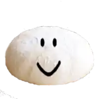 a smiley face is drawn on a piece of white dough