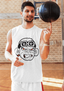 a man wearing a white tank top with an angry monkey on it