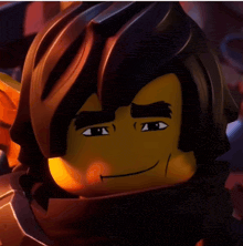 a close up of a lego character 's face with a smile on it