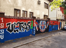 a wall with graffiti on it that says ultras on it