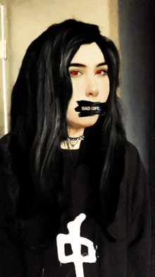 a girl with black hair and red eyes has a black tape over her mouth that says bad girl